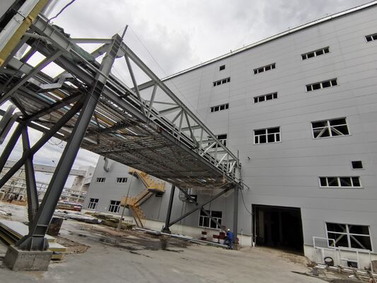 Large Span Metal Structure Warehouse Raw Material Storage Building Z‑type Purlin Wall Panels Disassembled Container Shipment